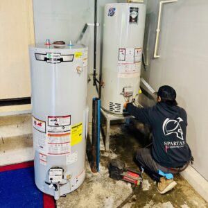 Man fixing water heater