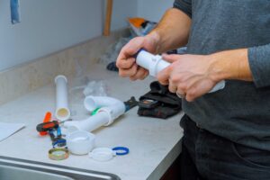 plumbing expert doing plumbing services