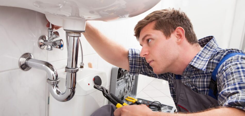 plumber fixing sinks