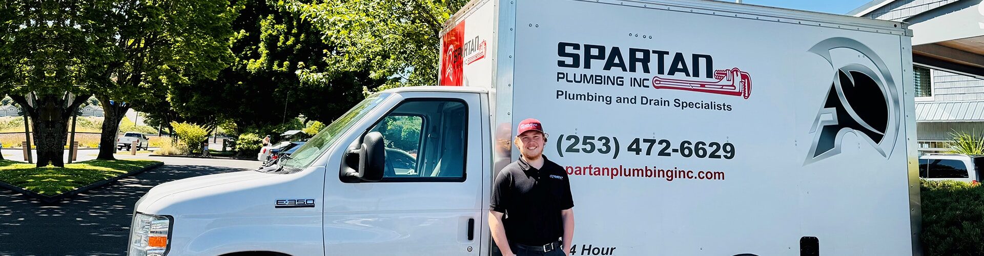 Spartan Plumbing Inc. Truck and one employee in Bonney Lake, WA