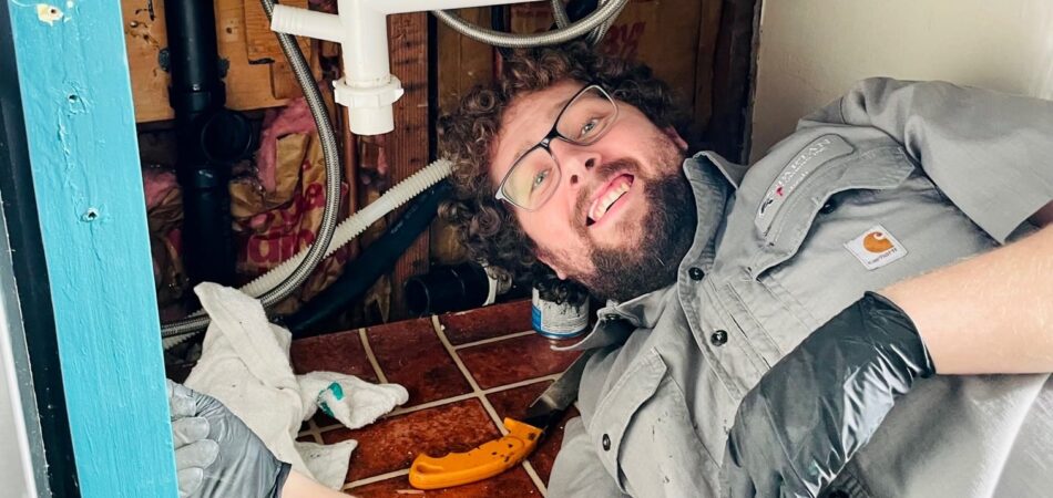 Josh working under the sink