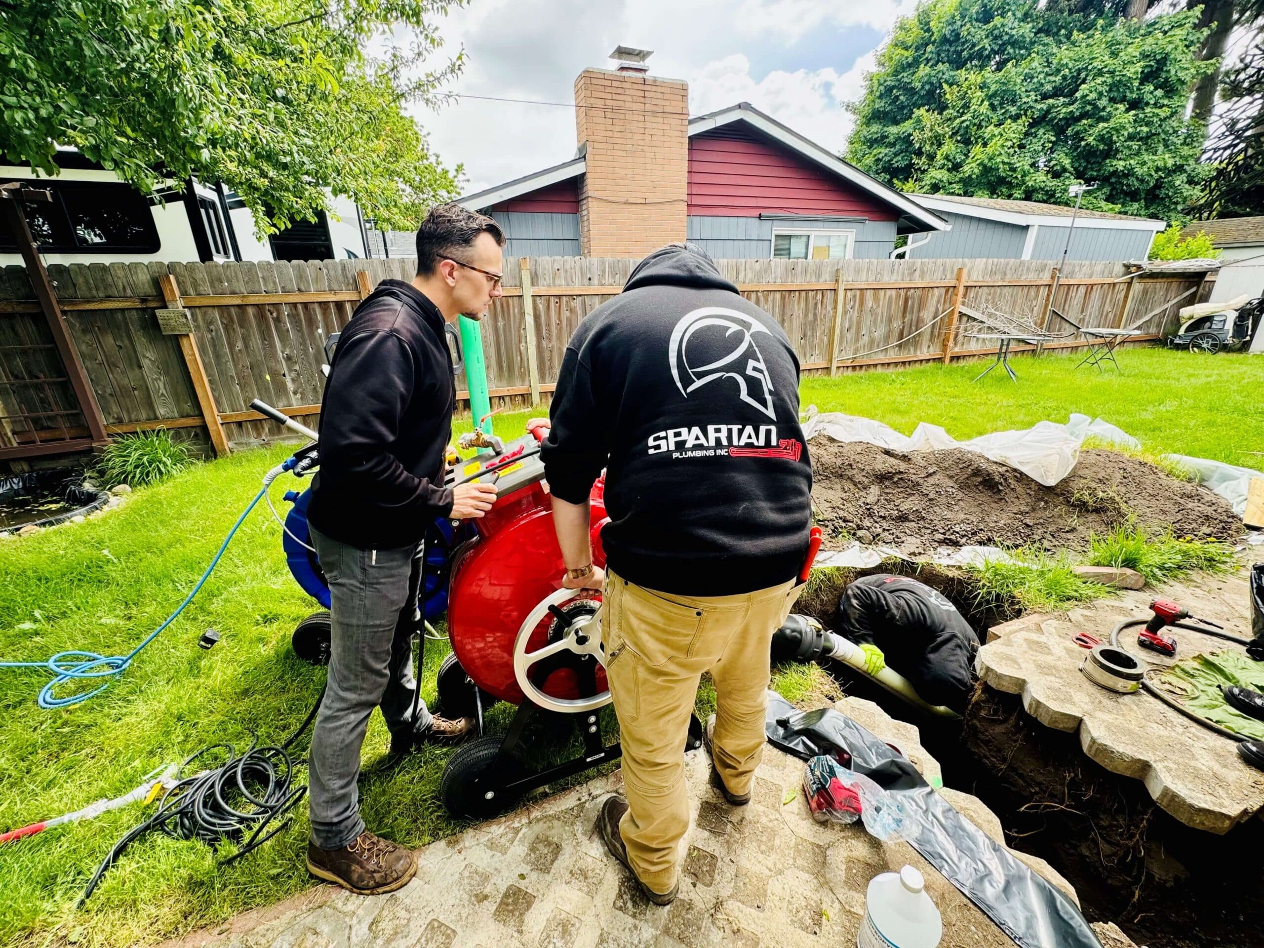 Spartan team replacing sewer lining