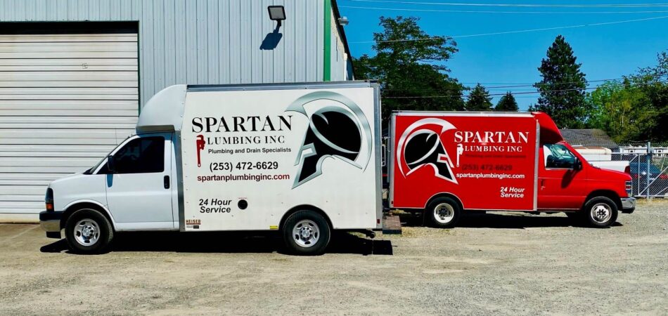 Spartan Plumbing truck in yard