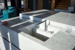 stylish-marble-sink-with-faucet-in-kitchen