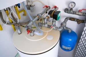 water heater tank with pipes and anode rod