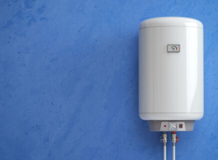 white water heater on a blue wall