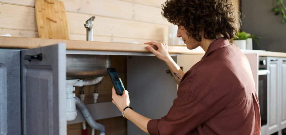 woman discover a hidden water leak